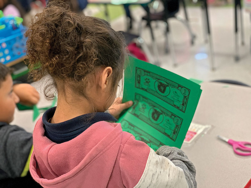From Creating Mini-Economies to Parsing Fictional Spending Scenarios, Here's How Librarians Teach Financial Literacy to Kids