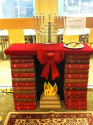 menorah on a table made of books