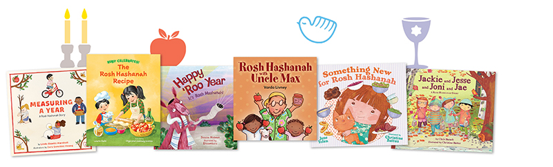 Rosh Hashanah book covers with holiday-themed decorative elements surrounding them.